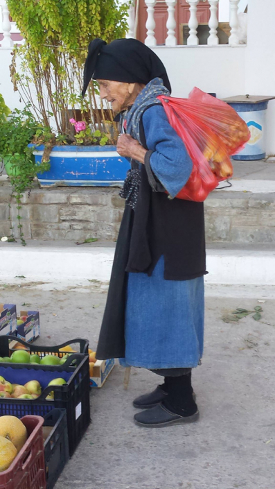 Woman in traditional Indigo dyed coat