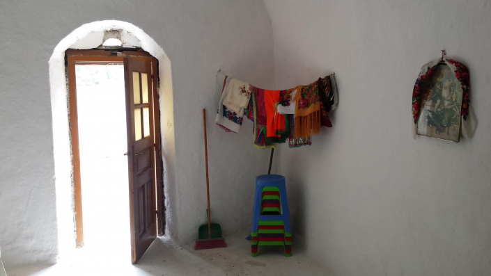 Chapel interior adorned with headscarves and textiles