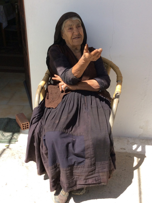 Andrigoni in traditional & heavily patched skirt